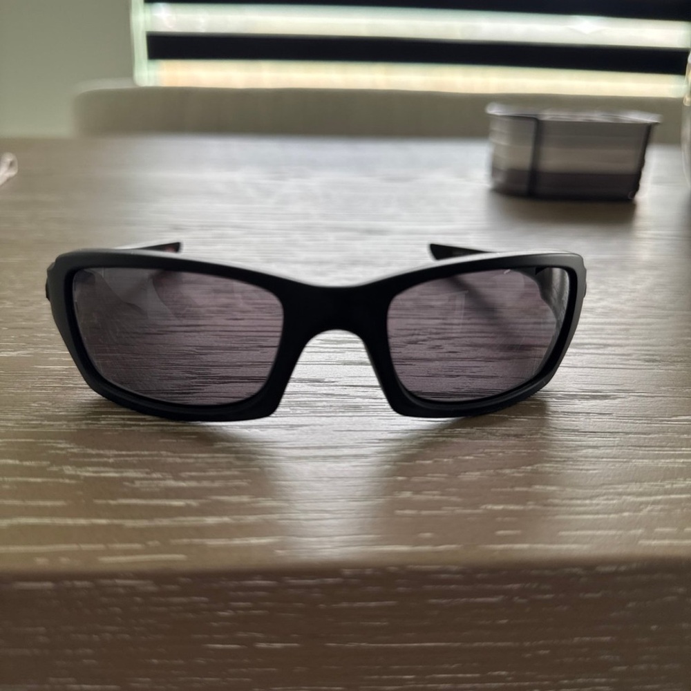 Oakley Sunglasses with Dark Lenses